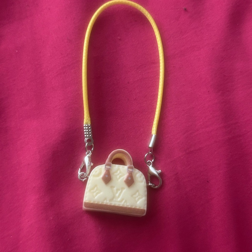 Yellow labubu purse